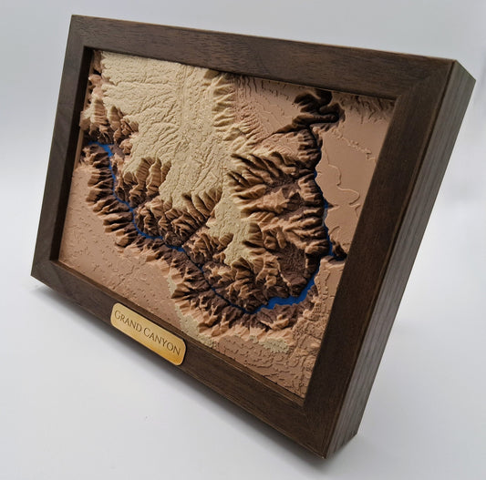 3D model of the Grand Canyon in a wooden frame on a white background