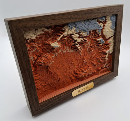 Wooden framed topographic map of Sedona on a white background