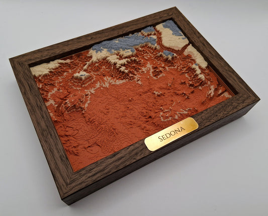 Wooden box with a textured map design labeled 'Sedona' on a white background