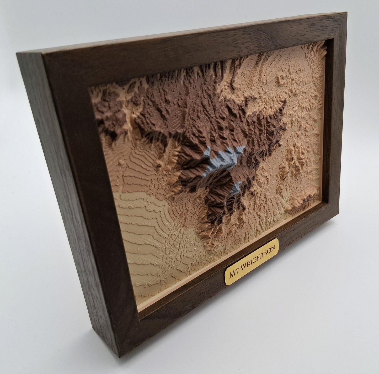 Wooden framed topographic map of a mountain with 'Mt. Wrightson' label on a white background