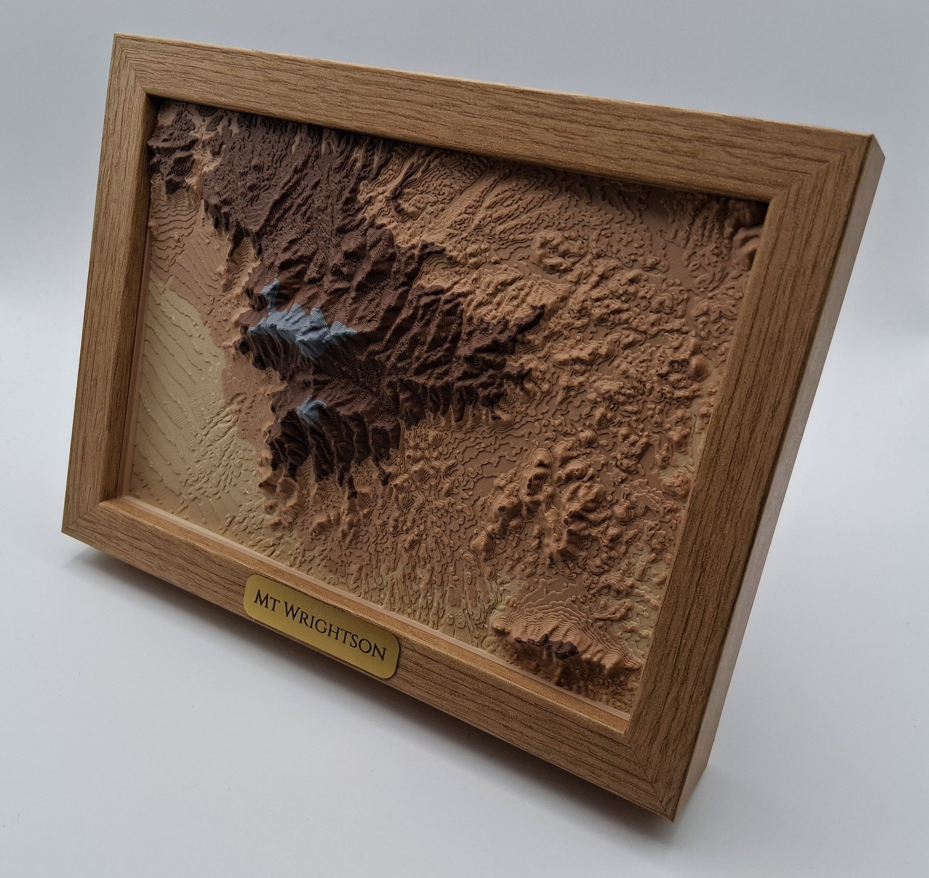 Wooden framed topographic map of Mount Wrightson on a white background