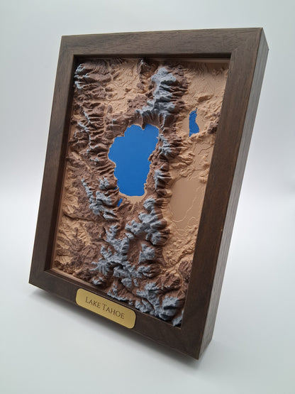 Topographic model of a lake with a wooden frame on a white background