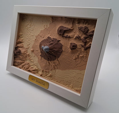 3D textured map of Mount Shasta in a white frame on a gray background